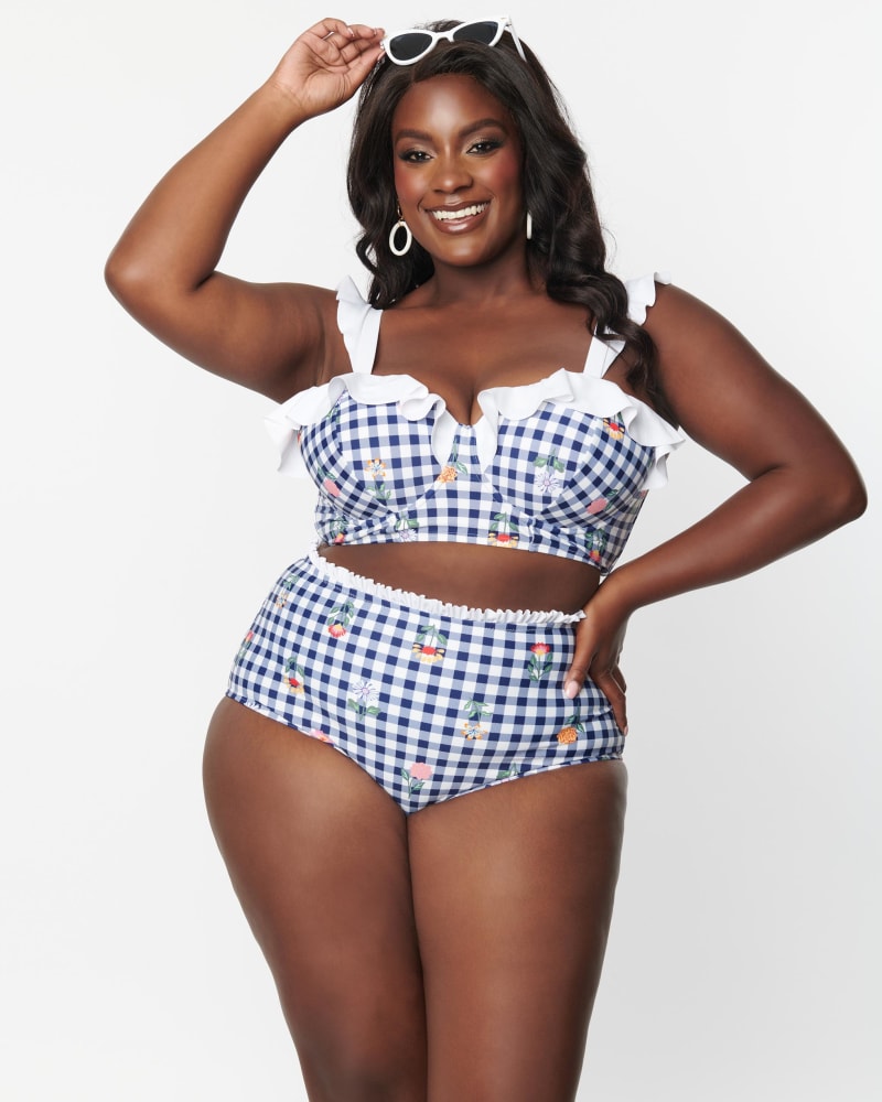 Front of a model wearing a size 1X Unique Vintage Navy Gingham & Floral Cape May Swim Bottoms in Blue, Gingham, Floral, Plaid by Unique Vintage. | dia_product_style_image_id:288464